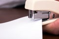 Stapler for binding sheets of paper closeup Royalty Free Stock Photo