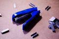 Stapler. Stapler blue. Stapler and staples. Stapler is on the table. Office. Office stapler Royalty Free Stock Photo