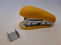 stapler with paper clips on a white background. Royalty Free Stock Photo