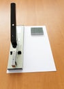 Stapler and staples with paper Royalty Free Stock Photo