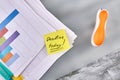 Stapler with work papers and sticky note. Royalty Free Stock Photo