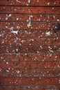 Staples and pins on a red notice board.. Royalty Free Stock Photo