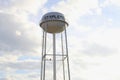 Stapleton water tower and cloudy blue sky