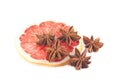 Star anis on a blood grape fuit slice Royalty Free Stock Photo