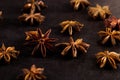 Star anise on black table. Concept, copy space Royalty Free Stock Photo