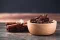 Close up of star anise and cinnamon stick on wooden background Royalty Free Stock Photo