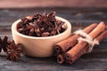 Close up of star anise and cinnamon stick on wooden background Royalty Free Stock Photo