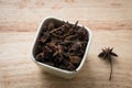 Star anise in ceramic container Royalty Free Stock Photo