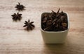 Star anise in ceramic container Royalty Free Stock Photo