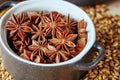 Star anise in a ceramic dish. Additives for brewing beer