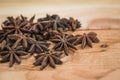 Star anise dried herb on wood for background. Royalty Free Stock Photo