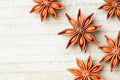 Star anise fruits on the wooden board, top view Royalty Free Stock Photo