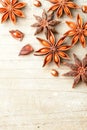 Star anise fruits on the wooden board, top view Royalty Free Stock Photo