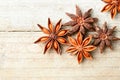 Star anise fruits on the wooden board, top view Royalty Free Stock Photo