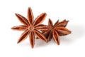 Star anise spice. Two dry star anise fruits isolated on white background with shadow. Macro close-up top view of illicium verum or Royalty Free Stock Photo