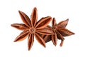 Star anise spice. Two dry star anise fruits isolated on white background without shadow. Macro close-up top view of illicium verum Royalty Free Stock Photo