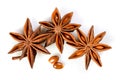 Star anise. Three star anise fruits with two seeds. Macro close up Isolated on white background with shadow, top view of chinese Royalty Free Stock Photo