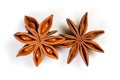 Star anise. Two star anise fruits. Macro close up Isolated on white background with shadow, top view of chinese badiane spice or Royalty Free Stock Photo