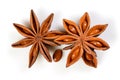 Star anise. Two star anise fruits with seed. Macro close up Isolated on white background with shadow, top view of chinese badiane Royalty Free Stock Photo