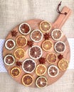 Star Anises and dried fruit on wooden cutting board Royalty Free Stock Photo