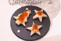 Star bread with red caviar, Champagne, card