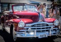 Star-burst sparkles of chrome grill and bumper of red vintage Pontiac Royalty Free Stock Photo