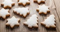 Delicious Homemade Christmas Tree and Star Shaped Cookies Dusted With Powdered Sugar Royalty Free Stock Photo