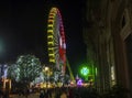 The great Christmas Ferris wheel in the city of Vigo, illuminated at night. Galicia, Spain.