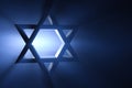 Star of David. Blue spotlight in background Royalty Free Stock Photo