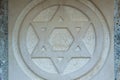 The Star of David engraved in the marble - traditional symbol of modern Jewish