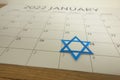 Star of David marking calendar date January 27, 2022, Holocaust memory day