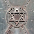 Star of David, old damaged metal door architectural building part, synagogue detail circle square symbol, sign closeup, Judaism