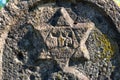 Star of David on the old gravestone Royalty Free Stock Photo