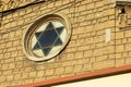 Star of David on a stone wall. Jewish religion