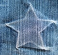 Star on denim texture. light blue natural clean denim texture Royalty Free Stock Photo