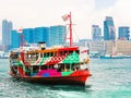 Star Ferry boat crosses the Victoria Harbour, Hong Kong Royalty Free Stock Photo