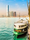 Star Ferry boat crosses the Victoria Harbour, Hong Kong Royalty Free Stock Photo