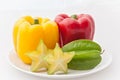 Star fruit with bell pepper isolated