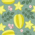 Star fruit seamless pattern. Ripe carambola with leaves and flowers on shabby background.