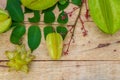 Star fruit on wood background