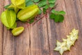 Star fruit on wood background