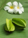 Star fruits on banana leave