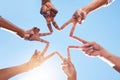 Star, hands and team, solidarity and peace with diversity and community collaboration with blue sky and sun. Team Royalty Free Stock Photo