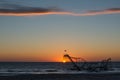 Star Jet Roller Coaster sunrise in the ocean