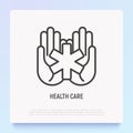Star of life symbol in hands, medical help thin line icon. Modern vector illustration