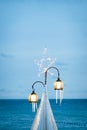 Star light with two cute lamp and transparent white curtain decorated on the summer beach in the evening romantic scene Koh Lipe,