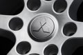 Star Mitsubishi logo-the symbol of the Japanese car company on the wheel close-up