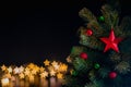 The star ornaments decorate on Christmas tree with star bokeh lights background. Royalty Free Stock Photo