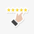 Star rating. Businessman holding a gold star in hand, to give five Royalty Free Stock Photo