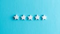 5 star rating customers satisfaction, white stars on light blue background